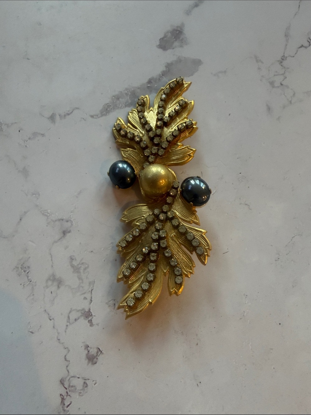 Gold Leaf Rhinestone Brooch with Dark Pearl Accents